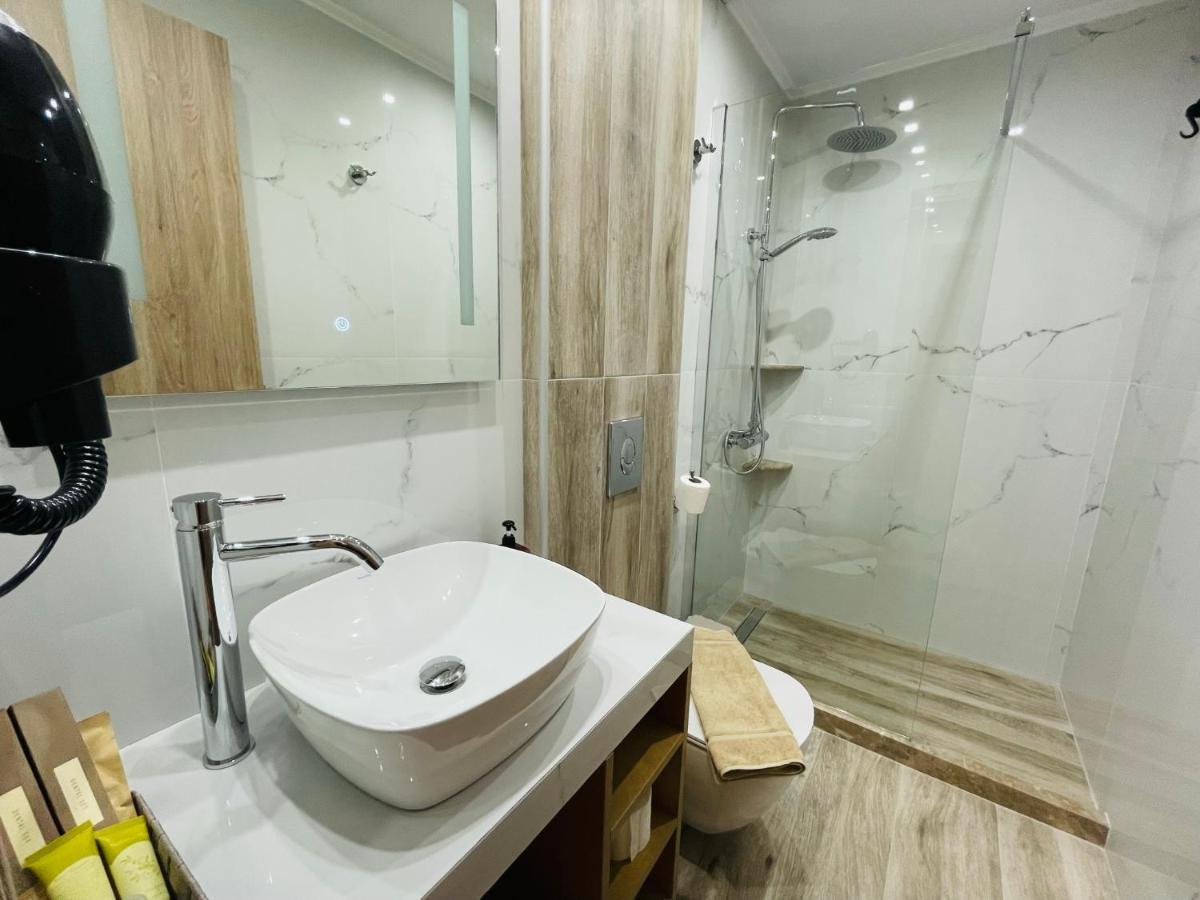 Xenios Suites Lygourio Buitenkant foto