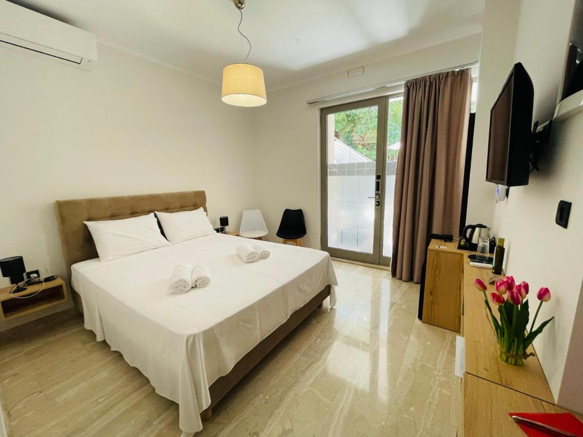 Xenios Suites Lygourio Buitenkant foto